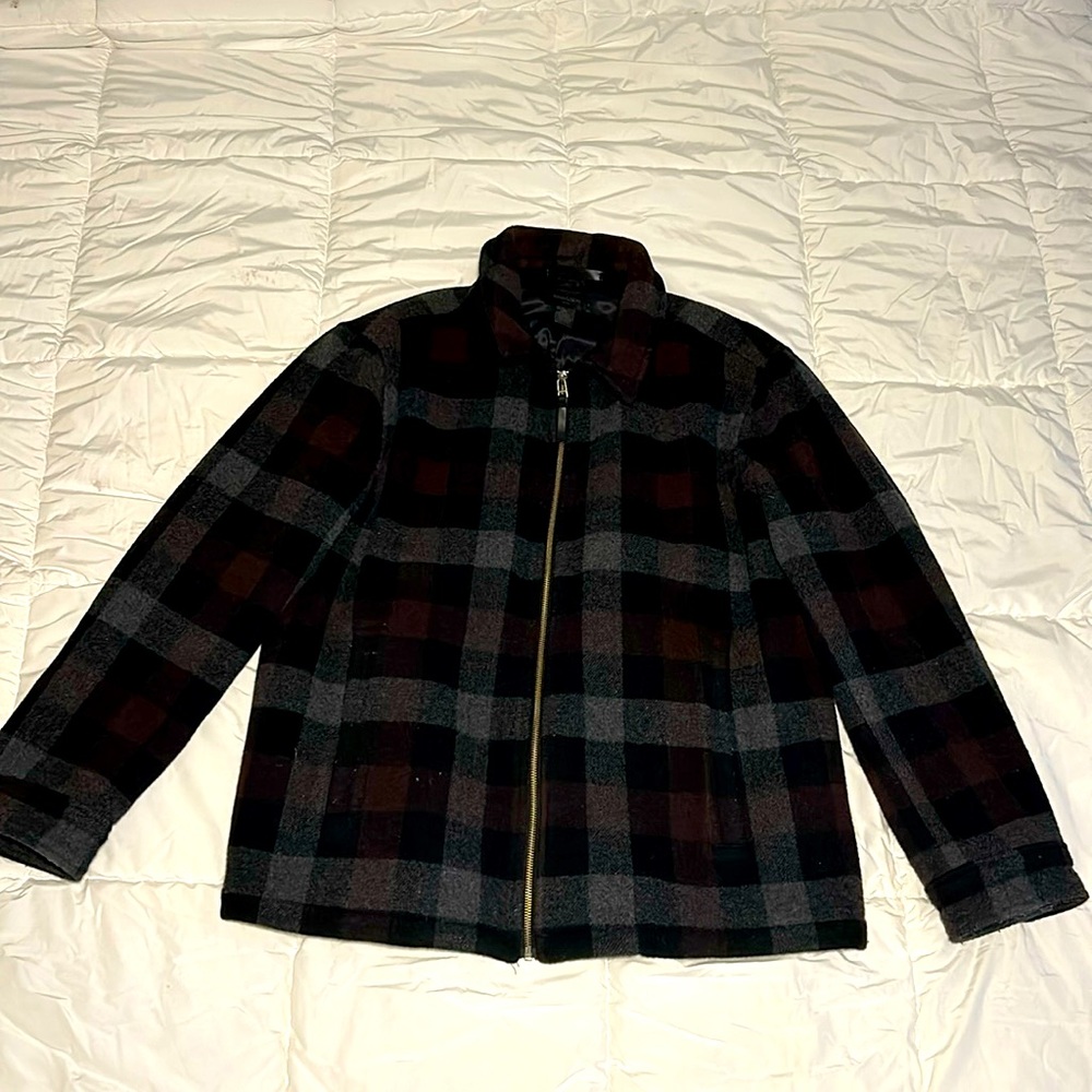 This jacket was never worn. Like new.